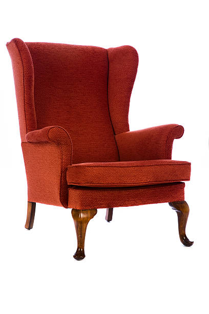 istock Old red wing backed chair on white background 117017289