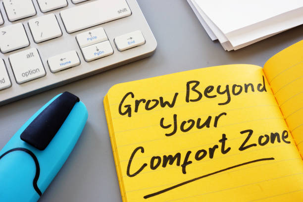 istock Writing note showing the text Grow beyond your comfort zone 1170172932