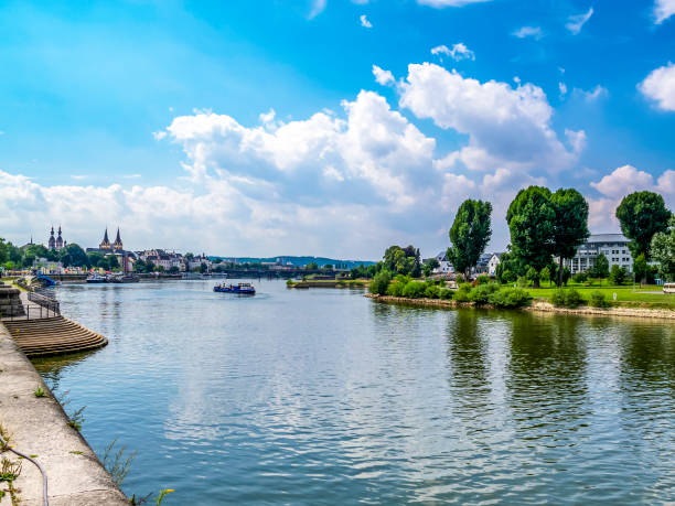 View of Moselle River with a ship, the old town of Koblenz, Rhineland-Palatinate, Germany in the background