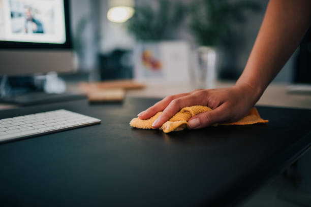 istock Cleaning desk in the office, close-up. 1170175699
