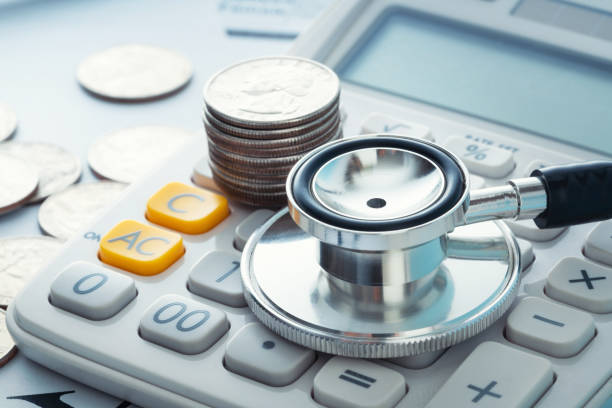 medical finance insurance - currency stethoscope medicare usa imagens e fotografias de stock