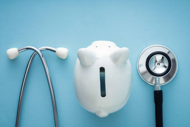 Cost of Healthcare Medical Insurance, Piggy Bank, Stethoscope, Coin Bank, Expense medical insurance stock pictures, royalty-free photos & images