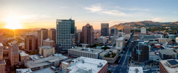Grand Panoramic of Downtown Salt Lake City Utah at Dusk Grand Panoramic of Downtown Salt Lake City Utah at Dusk salt lake city mormon temple utah photos stock pictures, royalty-free photos & images