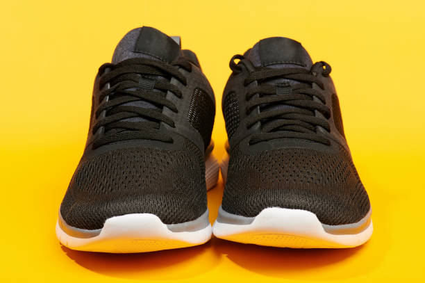 istock Front view of black sport shoes 1170180076