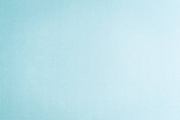 istock Cotton silk blended fabric wallpaper texture pattern background in light pale pastel green blue 1170192248