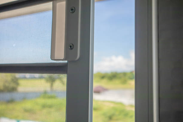 istock Open mosquito net wire screen on house window protection against insect 1170192339