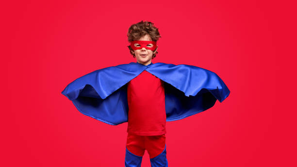 istock Little superhero in blue cape 1170192935