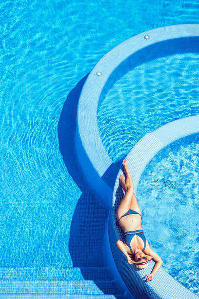 istock Woman in swimming pool. 1170193088