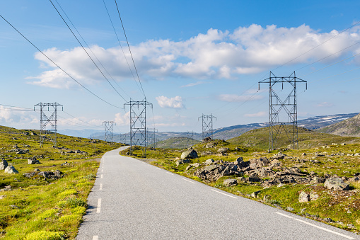 Scenics with electricity transmission pylons along the National Scenic route Aurlandsfjellet between Aurland and Laerdal in Norway.