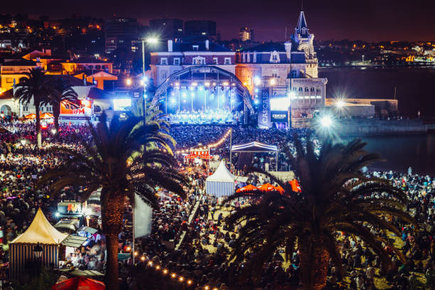 High perspective view of crowd at Festas do Mar 2019 in Cascais Bay, Lisbon region, Portugal Cascais, Portugal - August 25, 2019: High perspective view of crowd at Festas do Mar 2019 in Cascais Bay, Lisbon region, Portugal showtime stock pictures, royalty-free photos & images