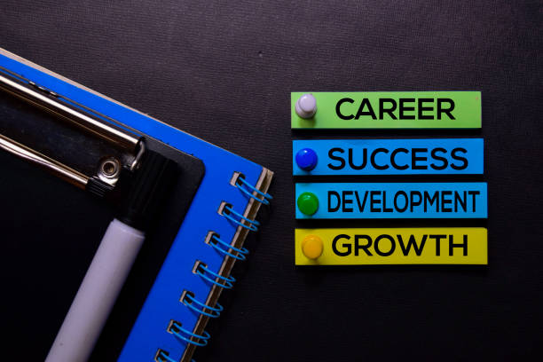 istock Career, Success, Development, Growth text on sticky notes isolated on Black desk. Mechanism Strategy Concept 1170204145