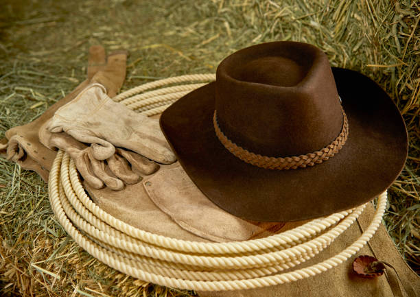 istock Cowboy Hat, Gloves, Boots and Rope 1170216428
