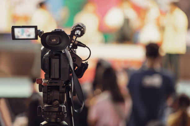 istock Professional video camera with abstract blurred background 1170217212