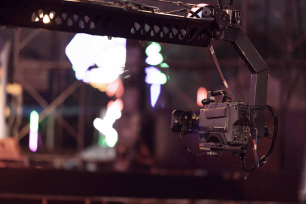 istock Professional camera on crane record live concert outdoors. 1170218043