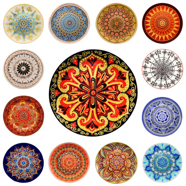 istock Set of decorative ceramic dishes hand-painted with acrylic paints floral pattern isolated on white background 1170223135