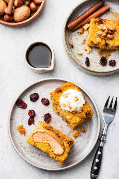 istock Pumpkin spice cake with cream and maple syrup 1170224261