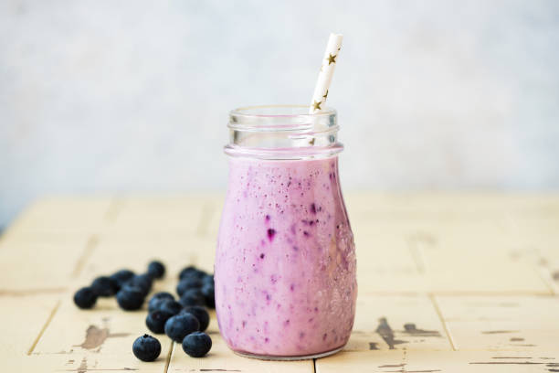 istock Blended blueberry smoothie in glass 1170224314