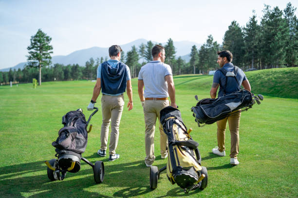 istock Friends Playing Golf on a Beautiful Sunny Day 1170231363