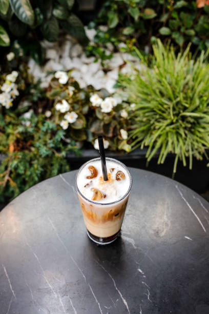 istock Delicious ice cold latte on marble table without straw 1170233243