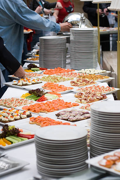 istock Buffet food and plates laid out on long table 117023528