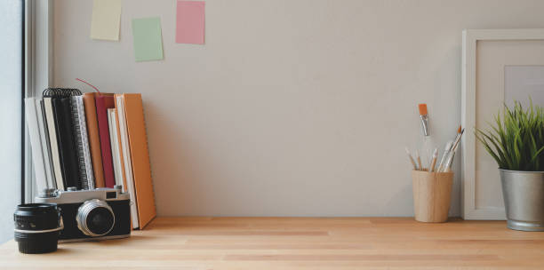 istock Minimal photographer workplace with laptop and copy space 1170240168