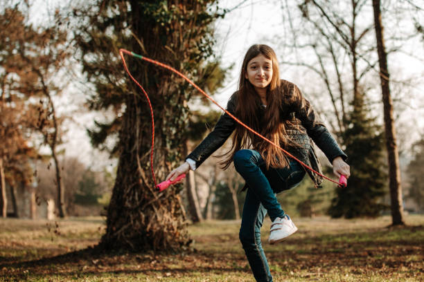 istock Girl playing with a jump rope 1170242450