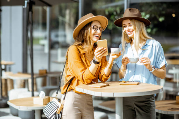 istock Girlfriends spending time together on a cafe terrace 1170247656