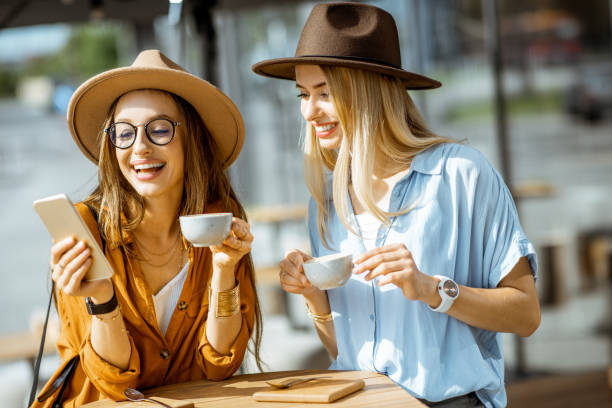 istock Girlfriends spending time together on a cafe terrace 1170247709