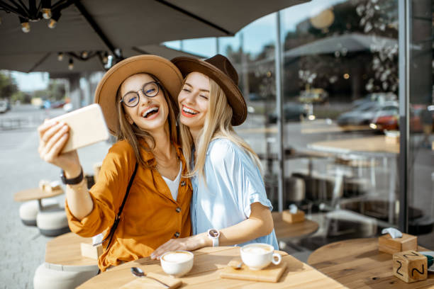 istock Girlfriends making selfie photo outdoors 1170247713