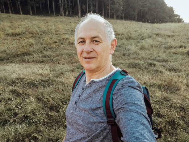 istock Senior man taking selfie 1170248592