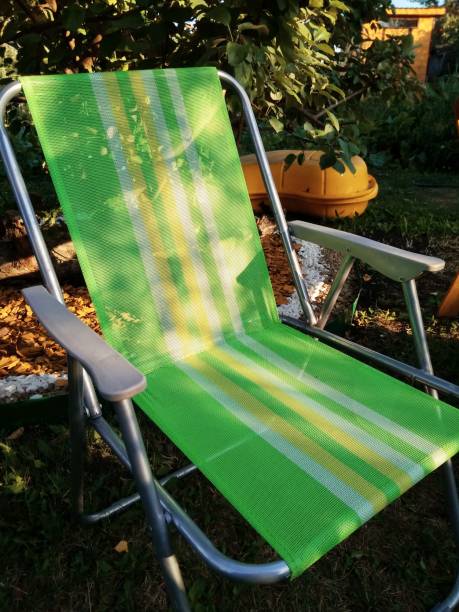 istock Folding Outdoor Camping Chair in Sunset 1170249178