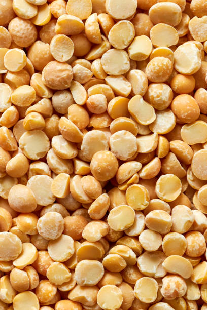 istock Background made of yellow split peas. 1170250827