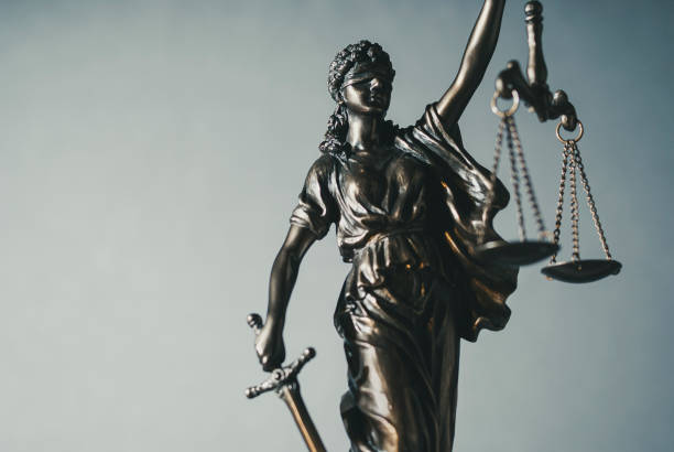 istock Silver statue of Justice wearing a blindfold 1170256238