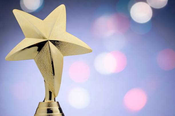 istock Textured gold star on a trophy award 1170256243