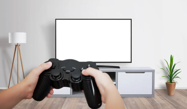 istock Boy play console game on isolated TV screen, for mockup, game presentation. 1170259062