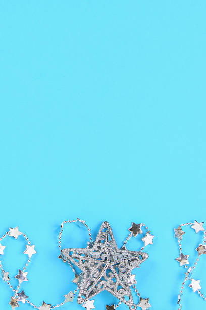 istock Christmas composition from Christmas tree toys. White decor on a blue background. 1170259349