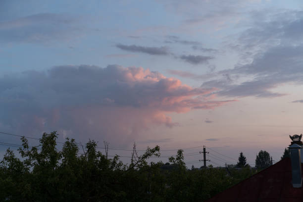 Russian villafe sunset sky with purple clouds