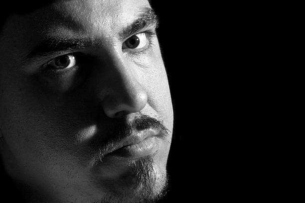 istock portrait of young serious man 117026230