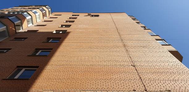 istock Brick high-rise buildings. Apartment building brick house. 1170264764