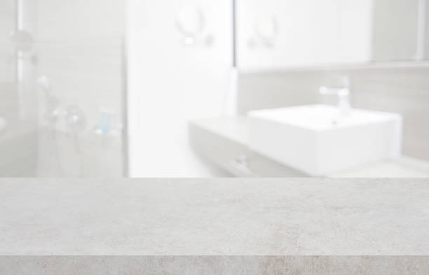 istock Stone table top and blurred hotel bathroom interior as background 1170264991