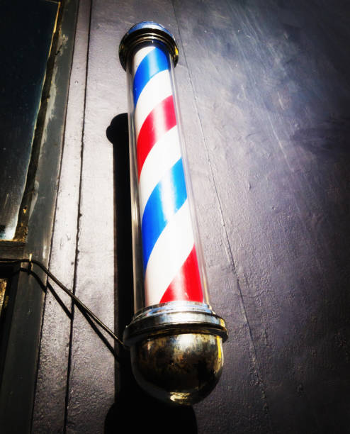 istock Traditional red, white, and blue barber's pole 1170265079