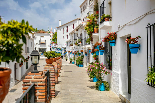 Beauty streets of Mijas Colorful streets of Mijas, nice strret in Mijas with colorful flower pots in the walls. mijas pueblo stock pictures, royalty-free photos & images