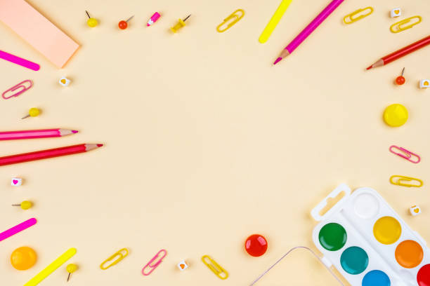 istock School accessories on a yellow background. Pastel colored. 1170270304