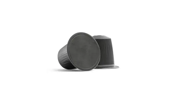 Photo of Blank black coffee capsule lying mock up, isolated, front view