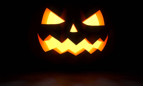 istock A glowing Jack O Lantern in a dark. 3D Rendering illustration 1170270987
