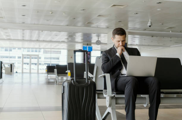 istock Businessman at airport 1170274817
