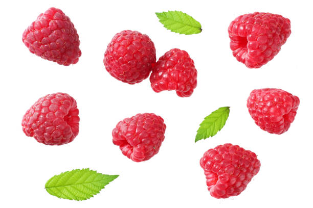 istock ripe raspberries with green leaf isolated on white background. top view 1170275247