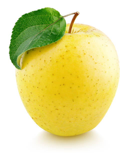 istock Yellow apple fruit with green leaf isolated on white 1170275597