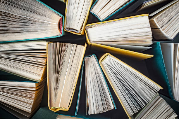 istock Hardcover books close-up top view, selective focus. 1170276778