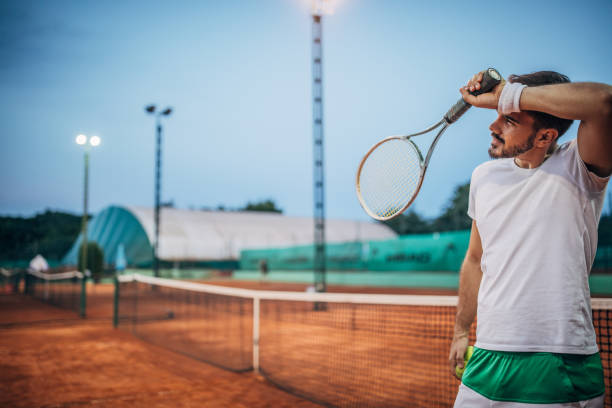istock Tired tennis player on court 1170277932